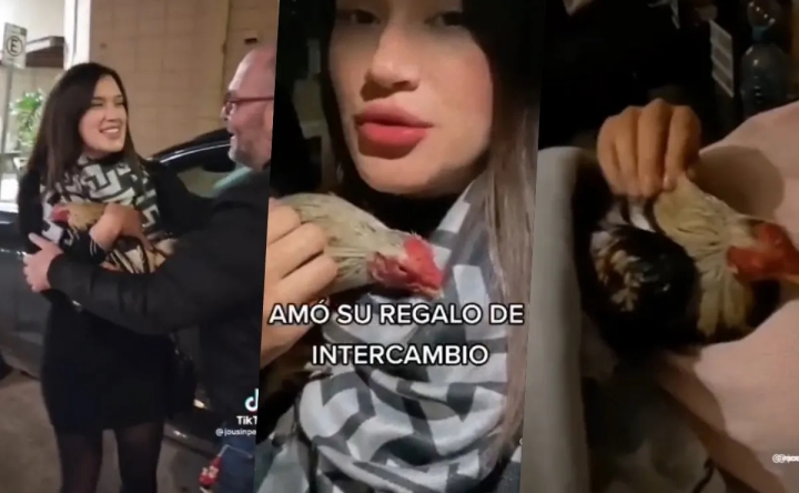 Mujer recibe un gallo como regalo de navidad