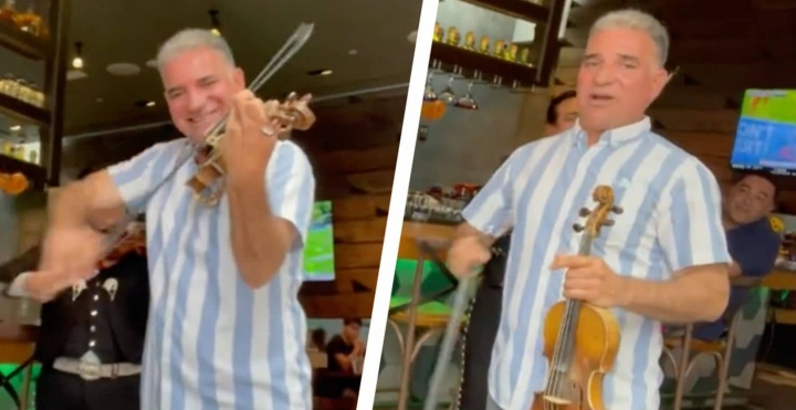 Hombre se roba el show de unos mariachis.