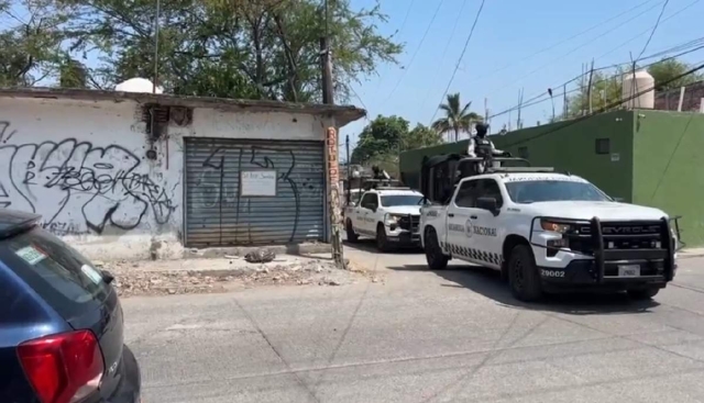   Agentes de la Guardia Nacional resguardaron la escena del crimen.