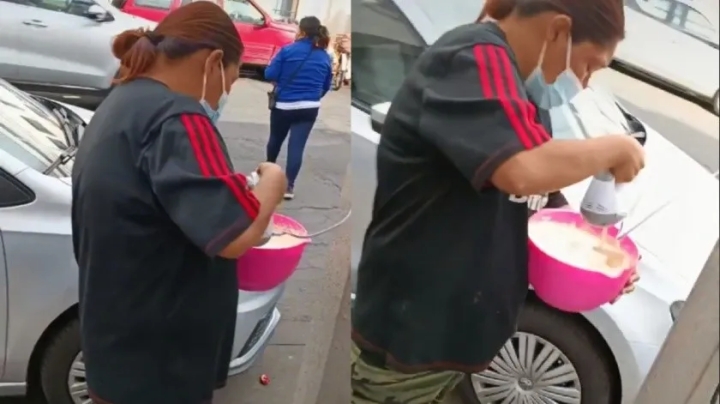 Mujer es captada usando poste de luz para conectar una batidora