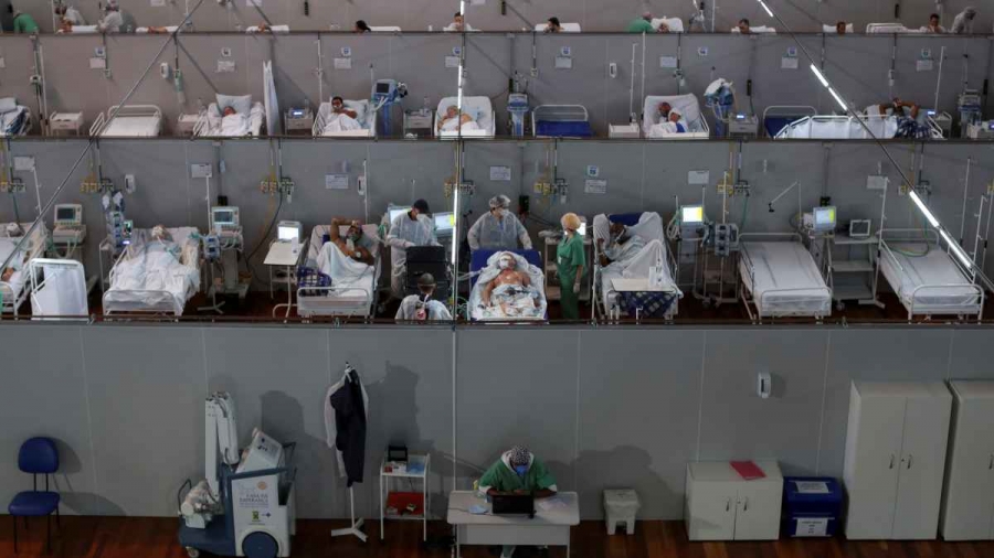 Niños de Hong Kong son atados a camas, durante cuarentena por COVID-19.