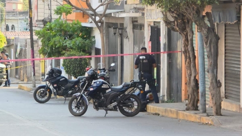   El cad&aacute;ver qued&oacute; sobre una acera.