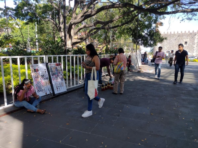 Con una sombrilla verde se distinguirá a comercio informal 