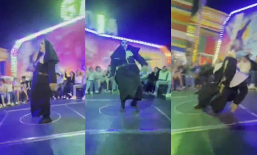 ¡Increíble caída! La 'monja de la feria' sorprende al perder el equilibrio en pleno baile