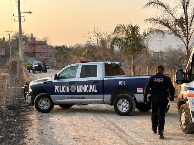 El cuerpo fue abandonado en una calle de terracería.