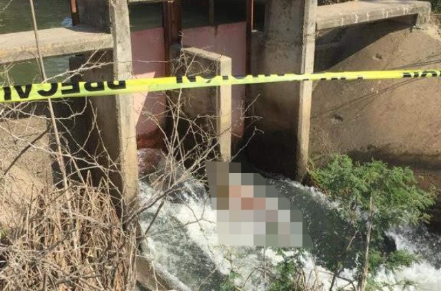 Hallan a un hombre muerto en un canal de riego